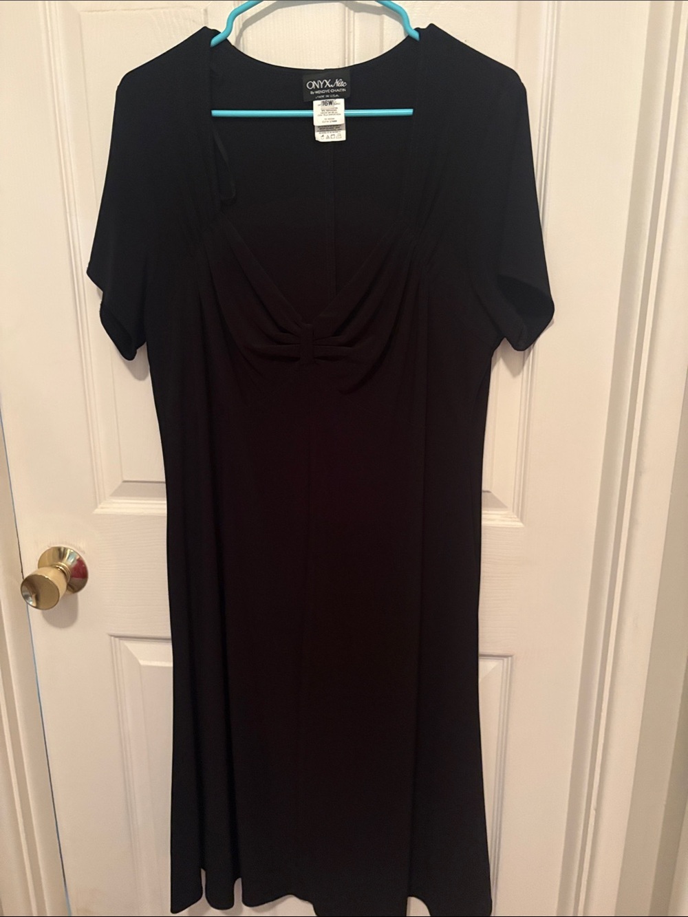 Onyx Nite Black Short Sleeve V-Neck dress with knot detail